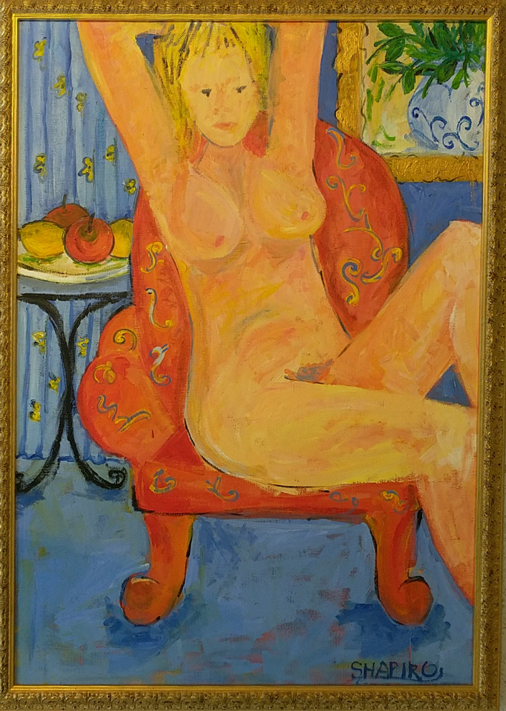 6. Lady on a red armchair